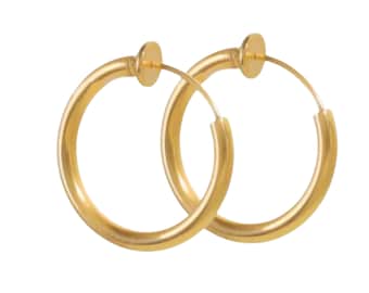 May include: A pair of gold-toned clip-on hoop earrings. The earrings are made of metal and have a smooth finish.