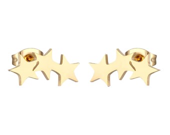 May include: A pair of gold-toned earrings featuring three small star shapes. The stars are connected to each other and are attached to a post.