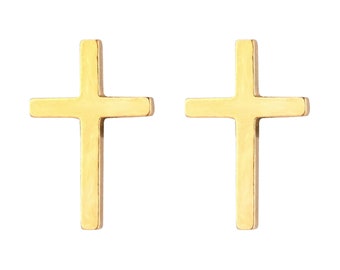 May include: A pair of gold cross earrings. The earrings are simple and elegant, and would make a great gift for any occasion.