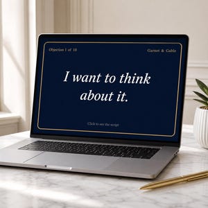 May include: A silver laptop displaying a dark blue screen with the text "Objection 1 of 10", "Garnet & Gable", "I want to think about it.", and "Click to see the script" in white and gold lettering, accompanied by a gold pen.