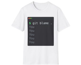 May include: A white short-sleeved t-shirt featuring a dark gray rectangular graphic resembling a computer terminal window. The graphic displays the command $ git blame . followed by the word You repeated five times in a light gray font.