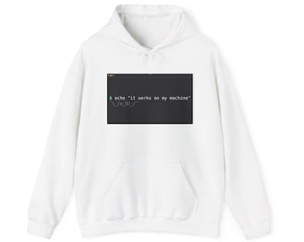 May include: A white hooded sweatshirt featuring a graphic of a dark gray computer terminal window. The text inside reads: $ echo "it works on my machine" followed by a shrug emoticon. The hoodie includes a front kangaroo pocket and drawstrings.