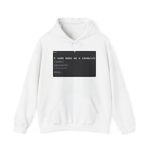 May include: A white long-sleeve hooded sweatshirt featuring a rectangular graphic on the chest. The graphic displays a dark grey terminal window with the text: $ sudo make me a sandwich, [sudo] password: ********, okay.