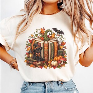 Camiseta vintage de Halloween, camiseta de gato bruja con libro, camiseta gráfica espeluznante de otoño, camiseta de gato negro con calabaza, camiseta acogedora para amantes de los libros de otoño