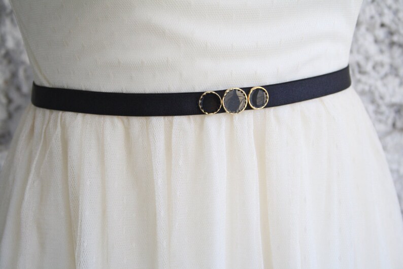 thin black waist belt