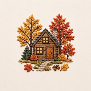 Puede incluir: Un diseño de bordado que muestra una cabaña de madera marrón con chimenea de piedra, rodeada de árboles otoñales en tonos amarillos, naranjas y rojos. Un pequeño pino verde, un camino de piedra y dos bellotas están bordados en la base.
