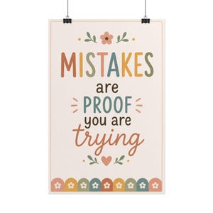 May include: A vertical wall poster featuring the text MISTAKES are PROOF you are trying in multi-colored lettering. The design includes a small flower at the top, a heart in the center, and a scalloped border with small flowers at the bottom.