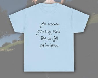 オリビア・ロドリゴのベビーTシャツ、アンラベルドツアー2026コンサート、90年代オーバーサイズTシャツポップミュージックグッズコンサート
