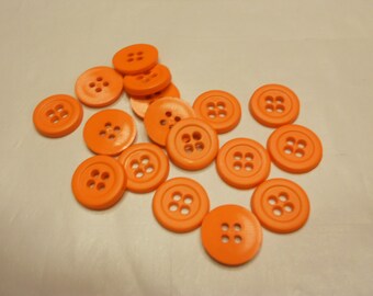 17 bright orange acrylic buttons, 14 mm (29)