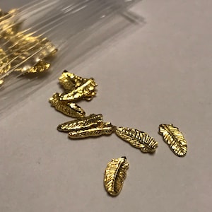 50 metal gold leaf feather nail decals 3 x 6 mm (S11/3)