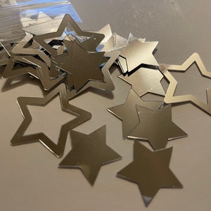 Large silver solid and open star confetti, 15 and 20 mm (2)-