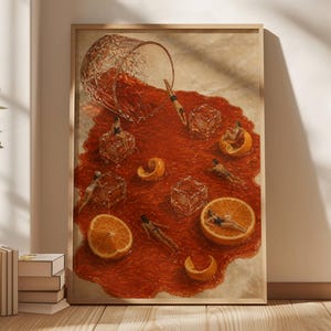 May include: A framed art print depicting a spilled glass of red liquid on a surface, with miniature figures lounging on ice cubes and orange slices floating in the pool of liquid. The scene includes a tipped crystal glass and citrus segments.