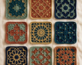 May include: Nine square crochet motifs arranged in a grid, featuring intricate geometric and floral patterns in a palette of navy blue, sage green, mustard yellow, and terracotta orange, each showcasing detailed yarn work and complex stitch textures.