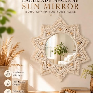 May include: A round wall mirror framed by off-white macrame cord in a sunburst pattern, featuring knotted geometric designs and light wooden beads. The text reads: HANDMADE MACRAME SUN MIRROR BOHO CHARM FOR YOUR HOME, Handmade with Love, 100% Natural Cotton, Boho Style Decor.