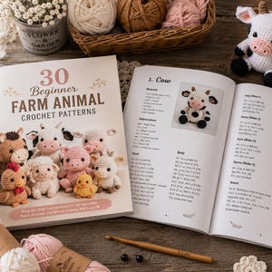 May include: A softcover book titled 30 Beginner Farm Animal Crochet Patterns featuring illustrations of crocheted animals on the cover and detailed written instructions for a cow pattern inside, accompanied by a 2.5 mm wooden crochet hook.