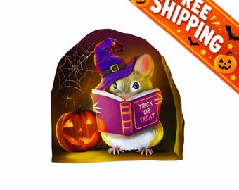 May include: A beanie featuring a graphic of a mouse wearing a purple witch hat and reading a purple book titled Trick or Treat. Beside the mouse is a glowing orange jack-o'-lantern and a spider web against a dark, shadowy background.