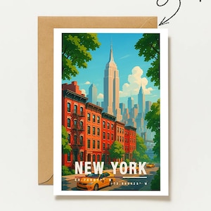 May include: A rectangular greeting card featuring a stylized illustration of a New York City street scene with red brick buildings, green trees, a yellow taxi, and the Empire State Building. The text NEW YORK is printed at the bottom.