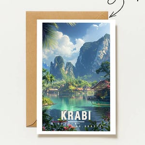 May include: A rectangular greeting card featuring a vibrant landscape illustration of Krabi, Thailand, with limestone cliffs, tropical greenery, and traditional buildings by the water. The text reads KRABI with coordinates below.