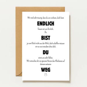 May include: A white greeting card with black German text that reads: Wir sind sehr traurig, dass du uns verlässt, doch letzt ENDLICH freuen wir uns für dich. Du BIST ja zum Glück nicht aus der Welt, doch schaffen müssen wir es nun trotzdem ohne dich. DU wirst uns sehr fehlen. Wir wünschen dir von ganzem Herzen das Allerbeste auf deinem weiteren WEG. A small smiley face is printed below the text. The card is paired with a brown envelope.