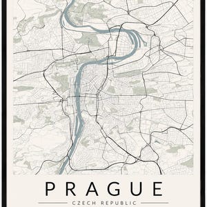 May include: A framed map print of Prague, Czech Republic, featuring a light beige background with black street lines and a blue river. The text reads PRAGUE, CZECH REPUBLIC, 50.0755° N, 14.4378° E, above a black line drawing of the city skyline.