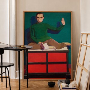 May include: A framed painting depicting a person in a green turtleneck sweater and brown trousers sitting on a red rectangular structure. The person holds an open book and raises one hand against a dark green background with a prominent shadow.