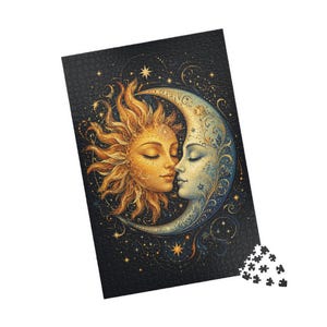 May include: A rectangular jigsaw puzzle featuring a golden sun with a human face and a silver crescent moon with a human face facing each other against a dark black background filled with golden stars and intricate swirling decorative patterns.