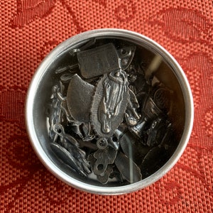 Watchmakers Tin of 50 Mexican Black-toned Milagros SHIPPING INCLUDED