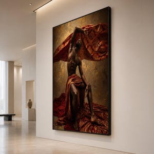 May include: A large rectangular wall art piece featuring a dark-skinned figure posed against a textured gold background. The figure is draped in flowing, deep red fabric that extends above and below, creating a dramatic contrast of color and light.