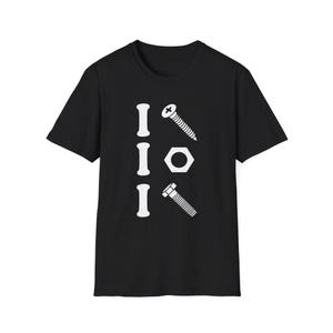 May include: A black short-sleeved t-shirt featuring a white graphic print on the chest. The design consists of three vertical letter I shapes arranged on the left, paired with a screw, a hexagonal nut, and a bolt on the right side.