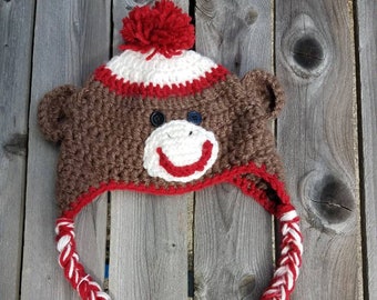 Sock Monkey Hat, crochet sock monkey beanie with braided tassel ear flaps