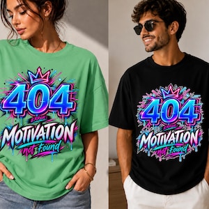 May include: A light green t-shirt and a black t-shirt, each featuring a vibrant graphic print with a crown icon above the text 404 ERROR: MOTIVATION not found in blue, pink, and white neon colours with a graffiti-inspired drip effect design.