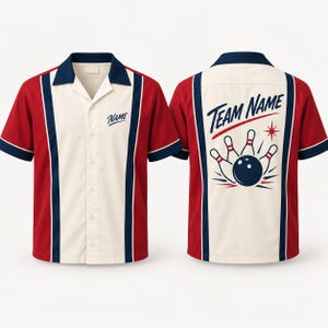 May include: A short-sleeve button-down bowling shirt featuring a cream center panel, red sides, and navy blue accents. The front displays the text NAME, while the back features a graphic of bowling pins and a ball with the text TEAM NAME.