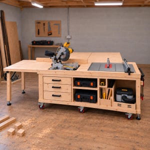 May include: A wooden mobile workbench featuring a miter saw and a table saw integrated into the top surface. The unit includes three drawers with black handles, open storage compartments containing tool cases, and red caster wheels.