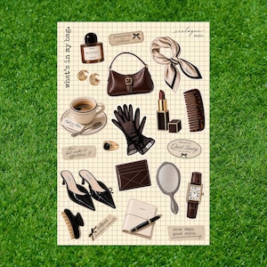 May include: A sticker sheet on a grid background featuring illustrations of a perfume bottle, a brown handbag, a silk scarf, a coffee cup, a lipstick, a comb, gloves, a ring, a card holder, a mirror, a watch, heels, a hair clip, and a notebook with a pen.