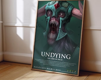 May include: A framed poster featuring a dark fantasy illustration of a creature with a teal helmet, a red gem, and a wide, toothy mouth. The text reads UNDYING THE LORD OF DECAY, followed by descriptive lore text and small icons at the bottom.