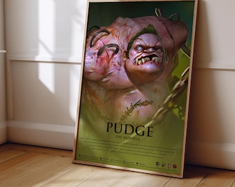 May include: A framed poster featuring a digital illustration of a pale, muscular creature with stitches on its skin, sharp teeth, and a green mohawk. The text PUDGE THE BUTCHER is printed in black below the character, followed by descriptive lore text.