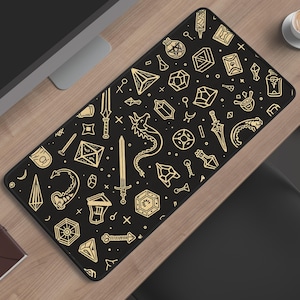 May include: A rectangular desk mat featuring a black background with a repeating pattern of gold-colored line art illustrations including swords, dragons, crystals, potions, and various geometric shapes arranged in a dense, organized layout.
