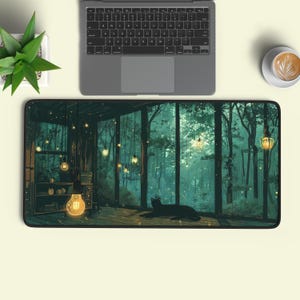 May include: A rectangular desk mat featuring a digital illustration of a black cat resting on a wooden floor inside a room with large windows overlooking a dark forest. Multiple glowing pendant light bulbs hang from the ceiling in the room.