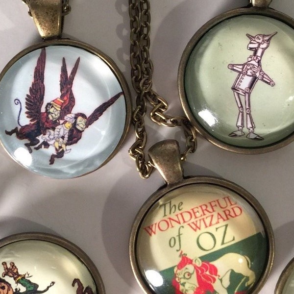 Wizard of Oz Glass Dome Necklaces, Tin Man, Scarecrow, Flying Monkeys, 1st Edition Cover Art