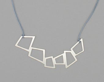 Large Sterling Silver Geometric Pendant Necklace on Blue Cord
