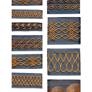 May include: A collection of dark blue fabric trim samples featuring various gold cord embroidery patterns, including wave designs, interlocking loops, diamond shapes, and circular motifs with small dark beads centred in the circles.