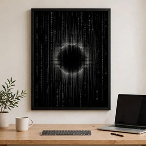 Puede incluir: Una pieza de arte mural rectangular con marco negro que presenta un diseño de matriz digital con columnas verticales de números binarios blancos cero y uno dispuestos en un patrón circular alrededor de un punto central negro sobre fondo oscuro.