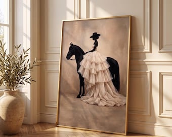 May include: A framed wall art print depicting a silhouette of a person wearing a wide-brimmed hat and a voluminous, tiered, cream-colored tulle gown, standing beside a solid black horse against a soft, neutral-toned, painterly background.