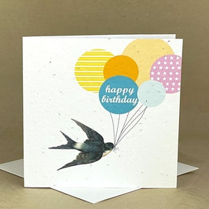 Carte ensemencée écologique plantable / Bonne hirondelle d’anniversaire avec des ballons colorés