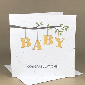 Pflanzbare Öko-Saatkarte / Buchstaben-Schreibweise "BABY" auf einem Ast