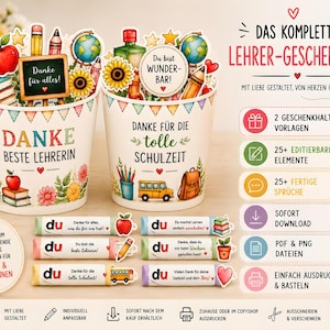 Puede incluir: Dos cubos de papel blanco decorados con ilustraciones de temática escolar, incluyendo manzanas, libros, lápices y girasoles. Los cubos presentan textos en alemán como Danke Beste Lehrerin y Danke für die tolle Schulzeit, acompañados de seis pequeñas etiquetas de regalo rectangulares.