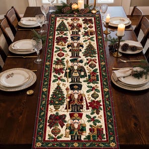 May include: A rectangular Christmas table runner featuring a cream-colored center panel with five nutcracker figures, decorated with green pine trees, red poinsettias, gift boxes, and ornaments, all framed by a dark green and red border.