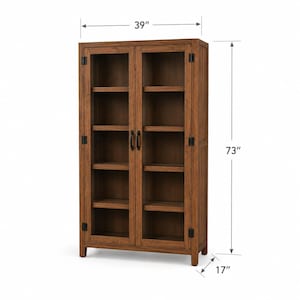 May include: A tall brown wooden cabinet with two glass-paneled doors, black metal hinges, and handles. The cabinet features four internal shelves and measures 39 inches wide, 73 inches high, and 17 inches deep as indicated by the dimension lines.