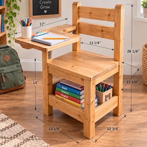 May include: A wooden school desk chair with a built-in writing surface, a lower storage shelf, and labeled dimensions. The desk measures 17 inches wide, 14 inches high to the surface, 28 1/4 inches total height, 13 1/4 inches wide, and 12 3/4 inches deep.