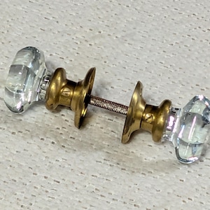 May include: A set of three ceramic mugs with a speckled, matte finish. The mugs are in shades of cream, light gray, and dark gray. Each mug has a simple, minimalist design, perfect for coffee or tea.